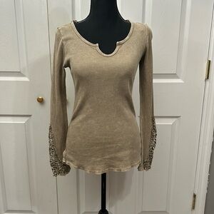 T Party top. Long sleeve. Waffle knit. Decorative detailing on sleeves. Size S.